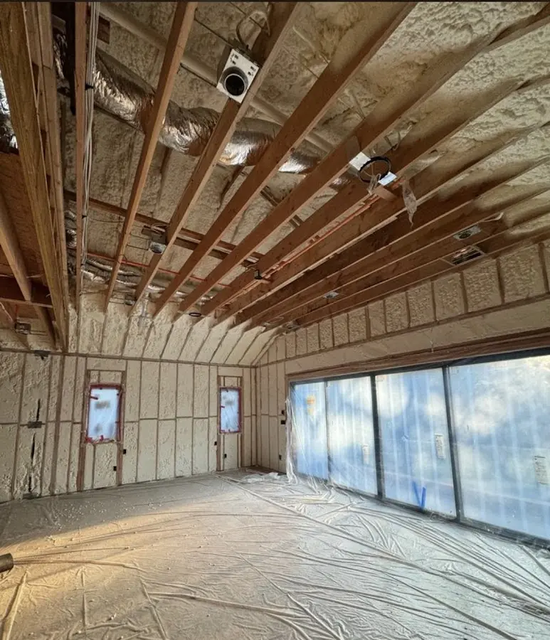 Interior walls and ceiling insulated with spray foam during new construction in Morristown